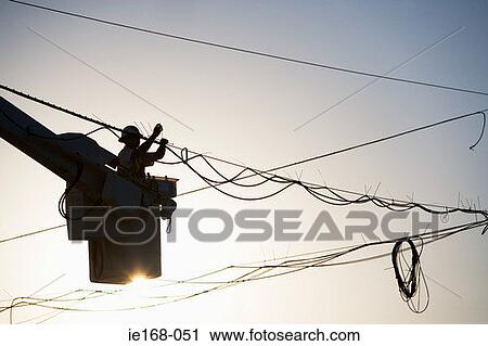 Person working on cables View Large Photo Image Stock Image - Person working on cables. Fotosearch