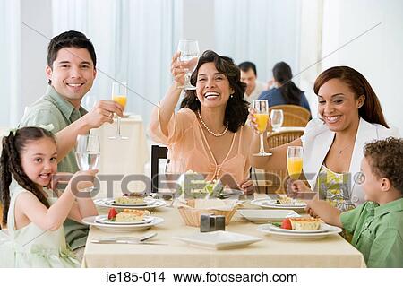 Family toasting View Large Photo Image Picture - Family toasting. Fotosearch