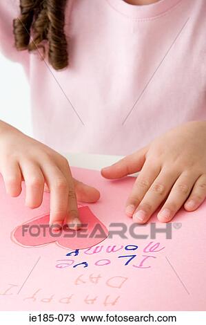 Girl making card View Large Photo Image Stock Image - Girl making card. Fotosearch