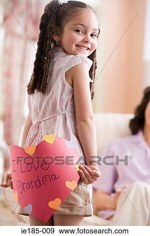 Girl with card for grandma View Large Photo Image Stock Photo - Girl with card for grandma. Fotosearch