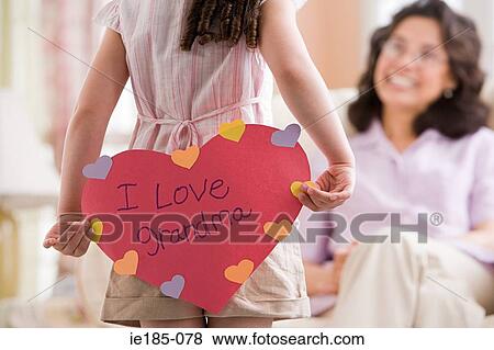 Girl with card for grandma View Large Photo Image Stock Photo - Girl with card for grandma. Fotosearch