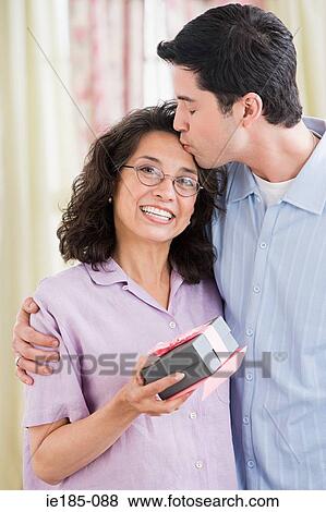 Son kissing mother View Large Photo Image Stock Photo - Son kissing mother. Fotosearch