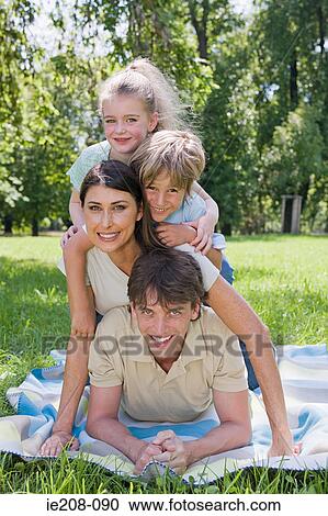 Family in the park View Large Photo Image Stock Image - Family in the park. Fotosearch