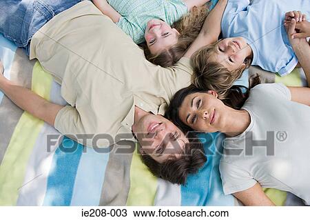 Family on blanket View Large Photo Image Stock Image - Family on blanket. Fotosearch