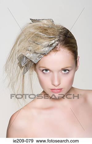 A woman having her hair highlighted View Large Photo Image Stock Photo - A woman having her hair highlighted. Fotosearch