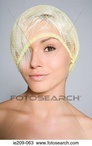 Portrait of a woman wearing a hairnet View Large Photo Image Stock Image - Portrait of a woman wearing a hairnet. Fotosearch