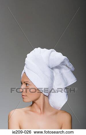 Stock Photograph - Portrait of a woman wearing a towel. Fotosearch