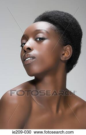 Stock Image - Portrait of a woman with a hairstyle. Fotosearch