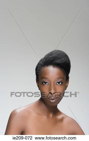 Stock Image - Portrait of a woman with a hairstyle. Fotosearch