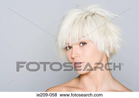 Stock Photo - Portrait of a woman with blonde hair. Fotosearch
