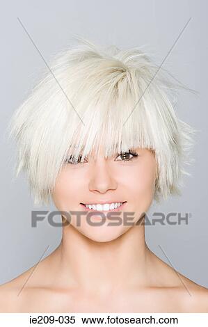 Portrait of a woman with blonde hair View Large Photo Image Stock Photography - Portrait of a woman with blonde hair. Fotosearch