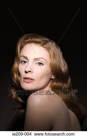 Portrait of a woman with ginger hair View Large Photo Image Picture - Portrait of a woman with ginger hair. Fotosearch