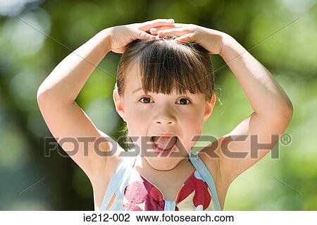 A surprised girl View Large Photo Image Stock Image - A surprised girl. Fotosearch