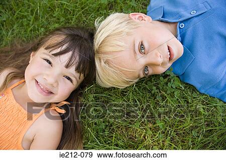 Portrait of a boy and girl View Large Photo Image Stock Photo - Portrait of a boy and girl. Fotosearch