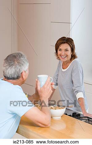 A couple having breakfast View Large Photo Image Stock Photography - A couple having breakfast. Fotosearch
