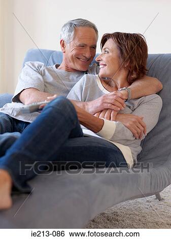Stock Photograph - A couple relaxing. Fotosearch