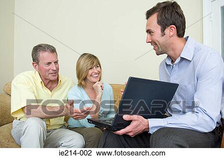 Couple and financial advisor View Large Photo Image Stock Image - Couple and financial advisor. Fotosearch