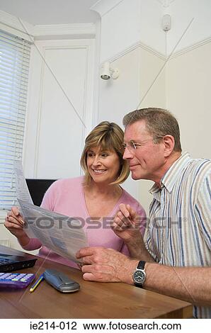 Couple doing home finances View Large Photo Image Stock Image - Couple doing home finances. Fotosearch