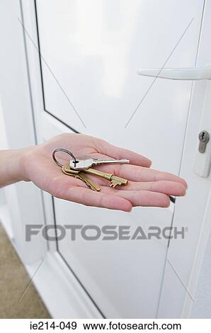 Person holding keys View Large Photo Image Stock Photo - Person holding keys. Fotosearch