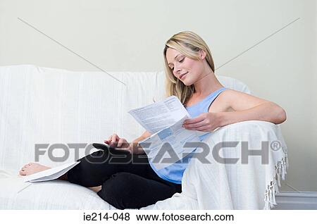 Woman doing home finances View Large Photo Image Stock Photo - Woman doing home finances. Fotosearch