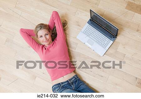 Woman with laptop View Large Photo Image Stock Image - Woman with laptop. Fotosearch