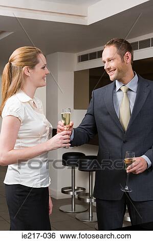 Couple drinking champagne View Large Photo Image Stock Photograph - Couple drinking champagne. Fotosearch