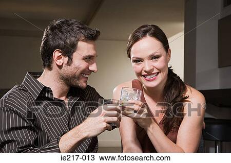 Couple drinking cocktails View Large Photo Image Stock Image - Couple drinking cocktails. Fotosearch