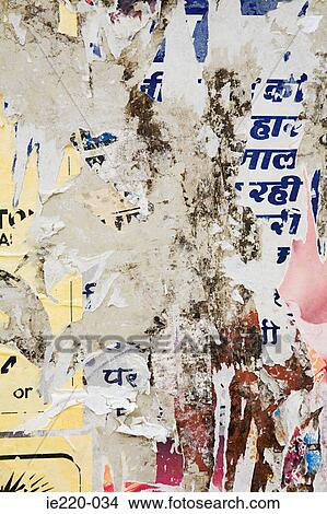 Torn posters on a wall View Large Photo Image Picture - Torn posters on a wall. Fotosearch