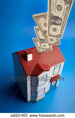 Money going into house View Large Photo Image Stock Image - Money going into house. Fotosearch