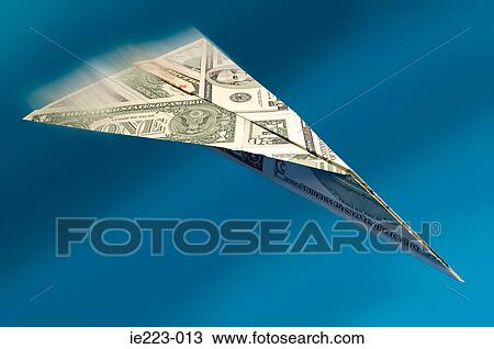 Paper aeroplane made of dollars View Large Photo Image Stock Image - Paper aeroplane made of dollars. Fotosearch