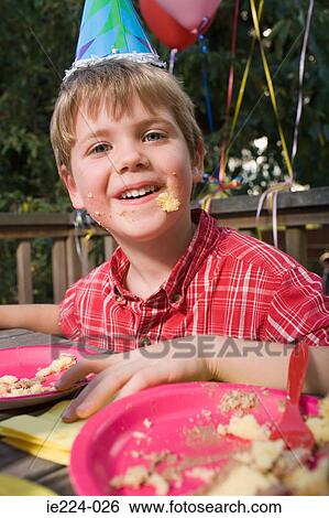 Boy with cake on his face View Large Photo Image Stock Photograph - Boy with cake on his face. Fotosearch