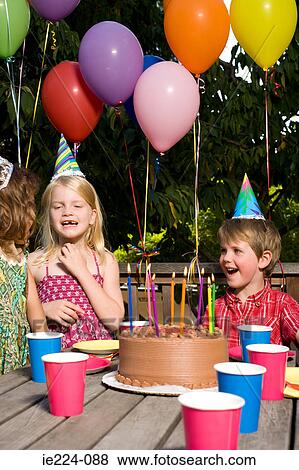 Children at birthday party View Large Photo Image Stock Photo - Children at birthday party. Fotosearch