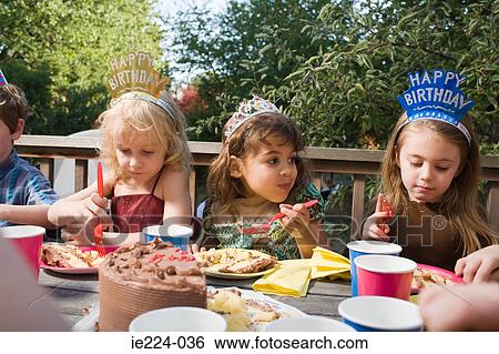 Children eating birthday cake View Large Photo Image Stock Photograph - Children eating birthday cake. Fotosearch
