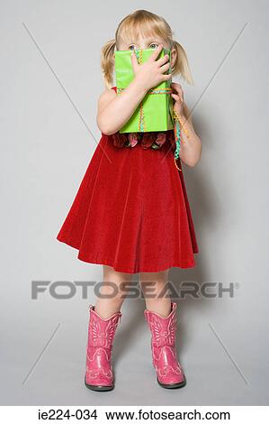 Girl with a birthday gift View Large Photo Image Picture - Girl with a birthday gift. Fotosearch