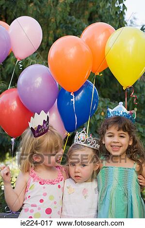 Girls at a birthday party View Large Photo Image Stock Photo - Girls at a birthday party. Fotosearch