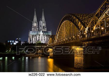 Bridge and cologne cathedral at night View Large Photo Image Stock Image - Bridge and cologne cathedral at night. Fotosearch