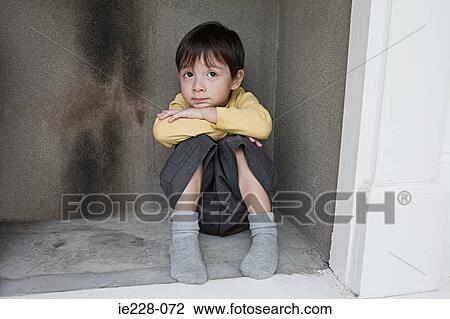 Boy hiding in a fireplace View Large Photo Image Stock Image - Boy hiding in a fireplace. Fotosearch