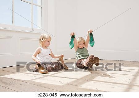 Girls dressing up View Large Photo Image Stock Photography - Girls dressing up. Fotosearch