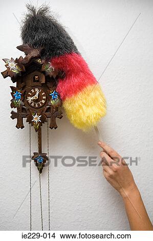 A person cleaning a cuckoo clock View Large Photo Image Picture - A person cleaning a cuckoo clock. Fotosearch