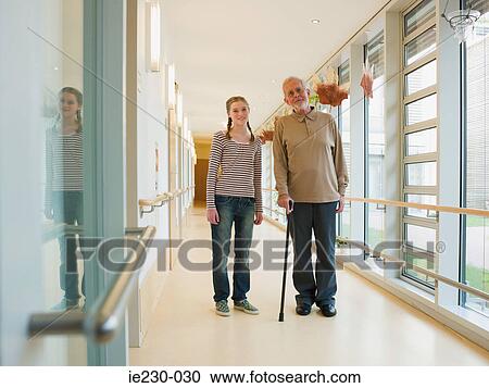 Stock Image - Grandfather and granddaughter. Fotosearch