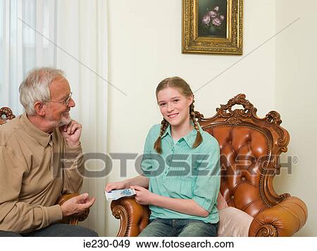 Grandfather and granddaughter View Large Photo Image Stock Photo - Grandfather and granddaughter. Fotosearch