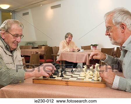 Senior men playing chess View Large Photo Image Stock Image - Senior men playing chess. Fotosearch
