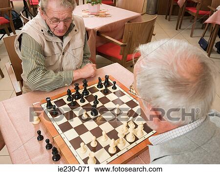 Senior men playing chess View Large Photo Image Stock Image - Senior men playing chess. Fotosearch