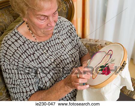 Senior woman doing crochet View Large Photo Image Stock Photo - Senior woman doing crochet. Fotosearch