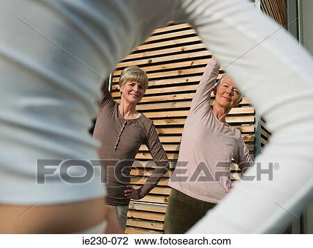 Senior women exercising View Large Photo Image Stock Image - Senior women exercising. Fotosearch