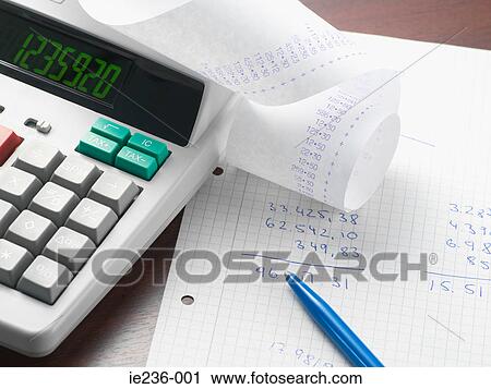 A calculator and sums on paper View Large Photo Image Stock Image - A calculator and sums on paper. Fotosearch
