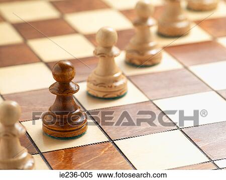 Chess pieces on a chess board View Large Photo Image Stock Photography - Chess pieces on a chess board. Fotosearch