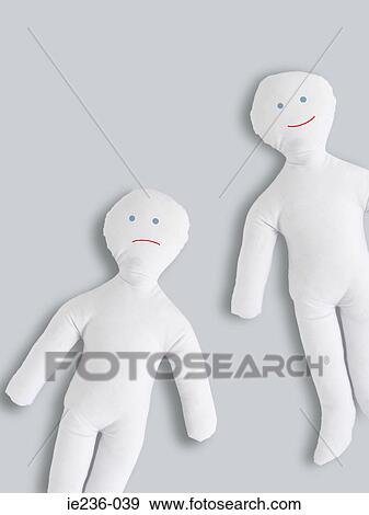 Dolls with sad and happy faces View Large Photo Image Stock Photo - Dolls with sad and happy faces. Fotosearch