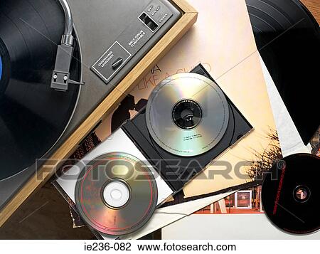 Record player records and cds View Large Photo Image Stock Image - Record player records and cds. Fotosearch
