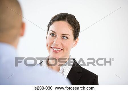 Businesspeople talking View Large Photo Image Stock Image - Businesspeople talking. Fotosearch